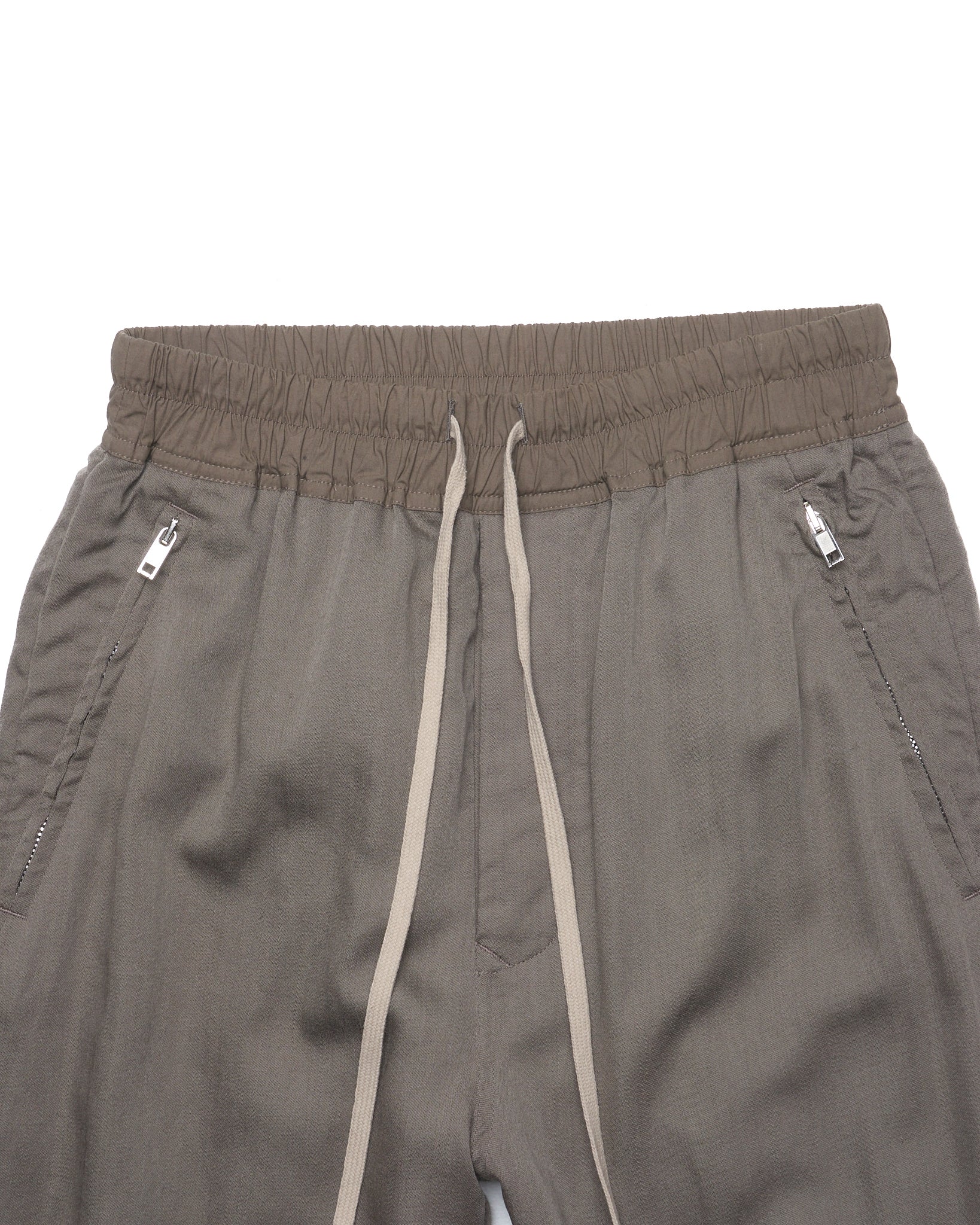 Gray pants with drawstring and zippers on a white background