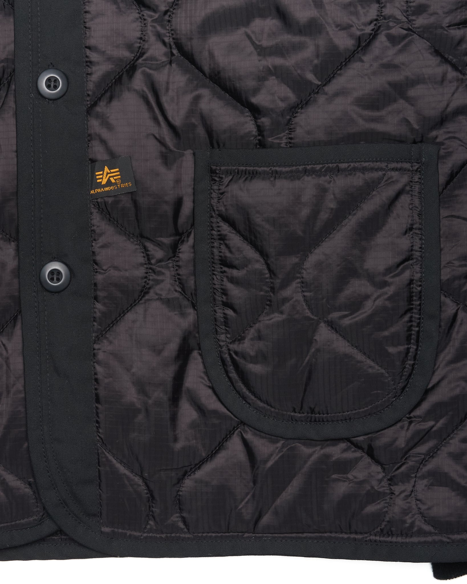 A/W25 CDG x Alpha Industries Quilted Military Liner Jacket