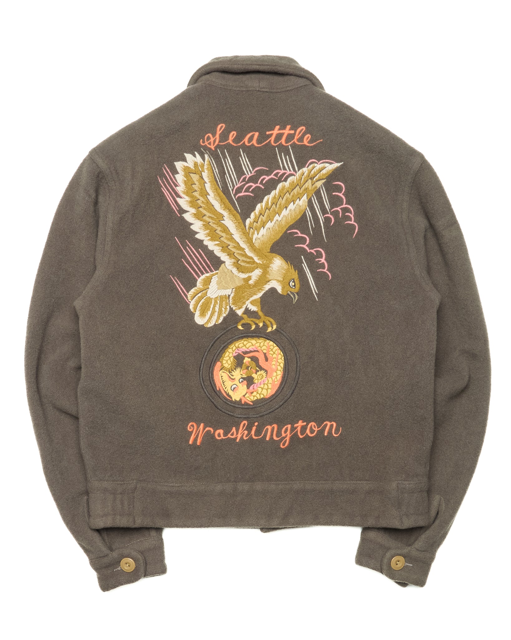 Brown jacket with an eagle design and 'Seattle Washington' text on a white background
