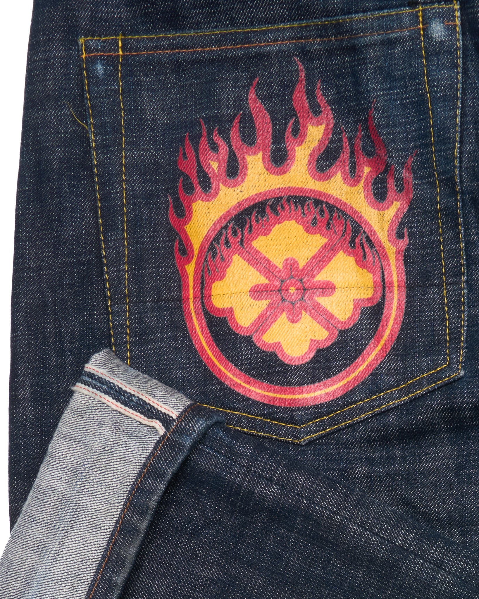 Denim pocket with a fiery symbol design