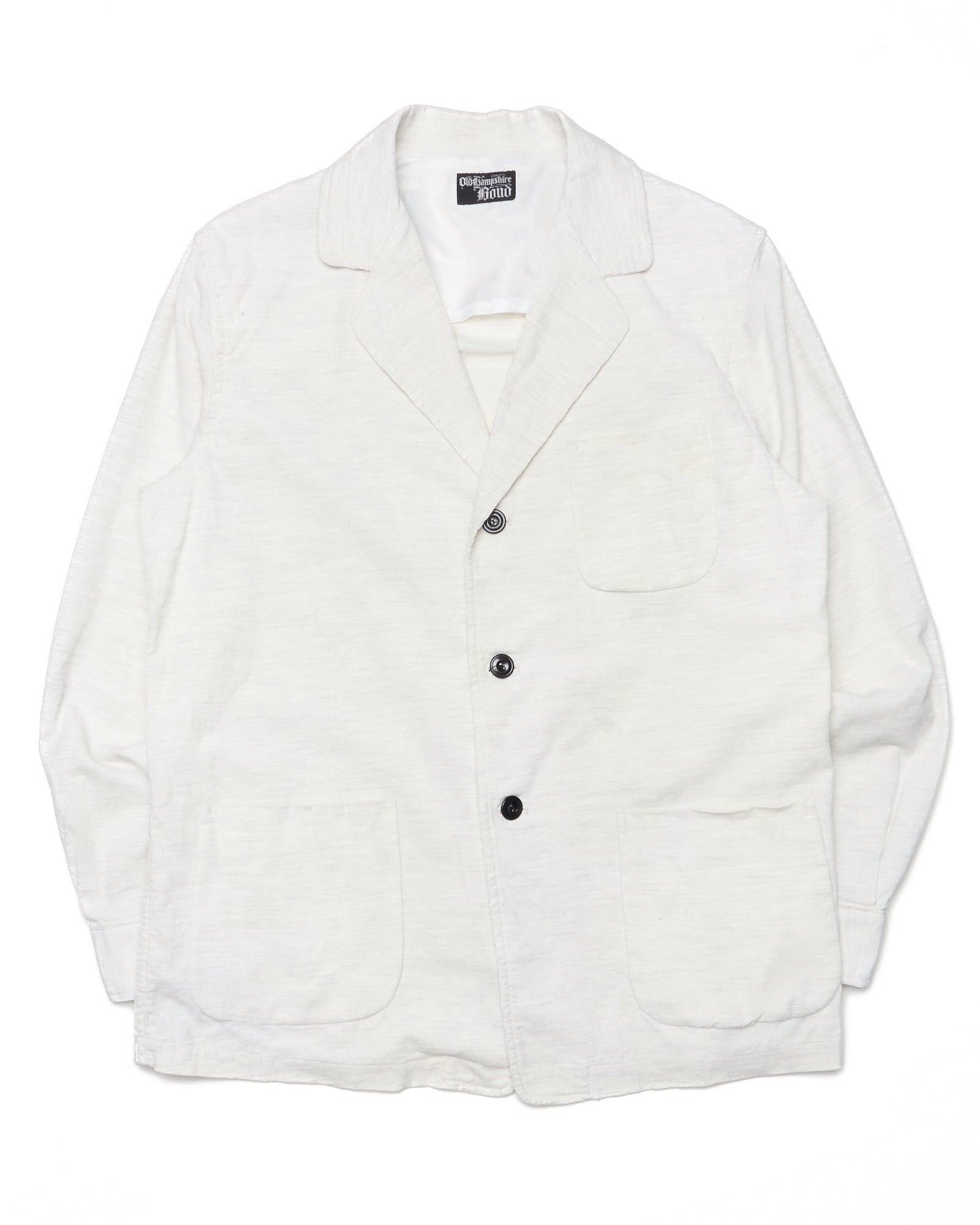 White jacket with black buttons on a white background