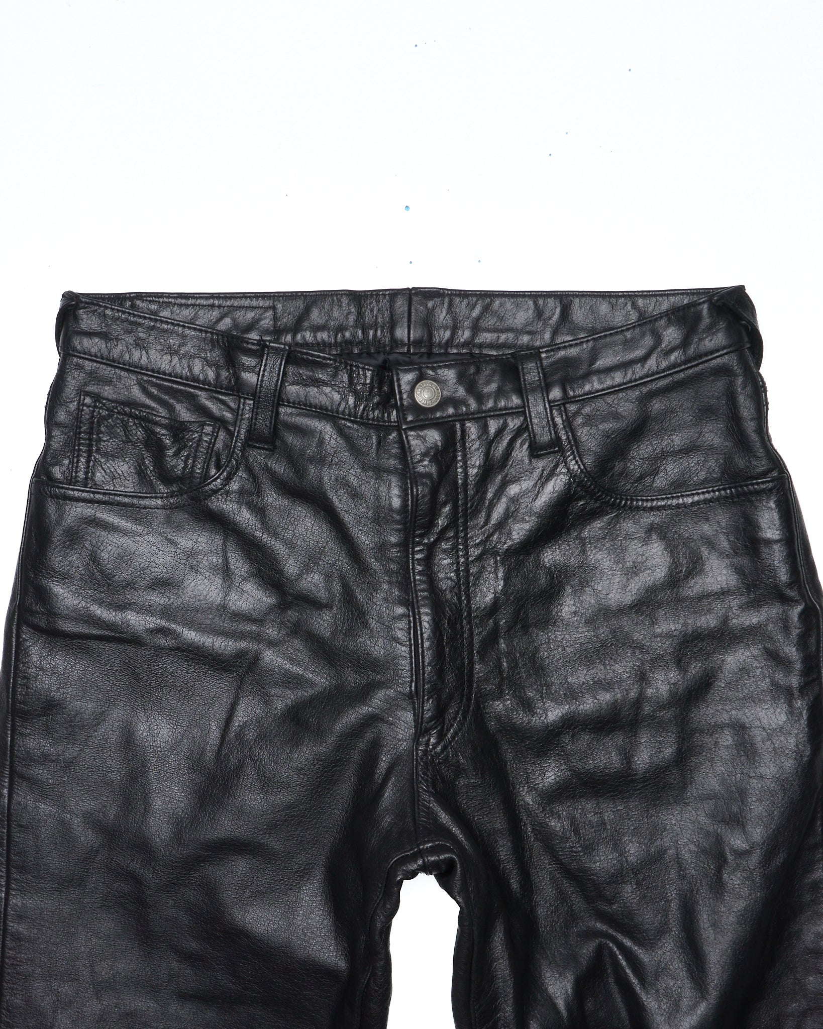 Black leather pants on a white background