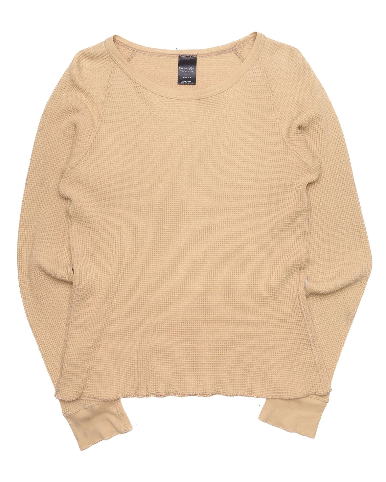 Beige shirt on a white background
