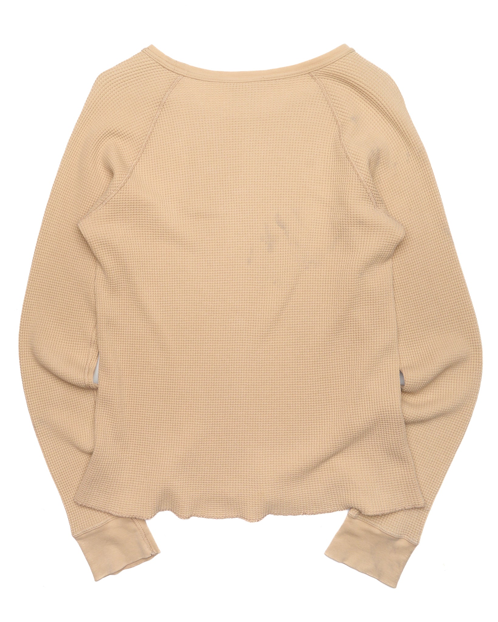 Beige long-sleeve shirt on a white background