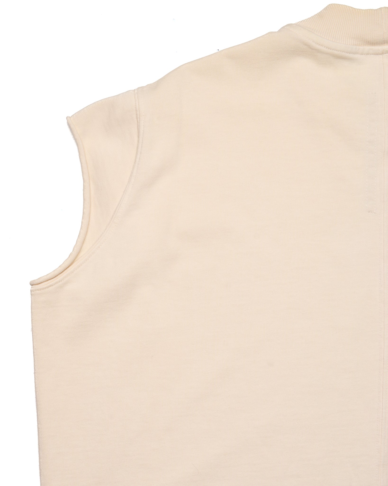 Beige sleeveless top on a white background