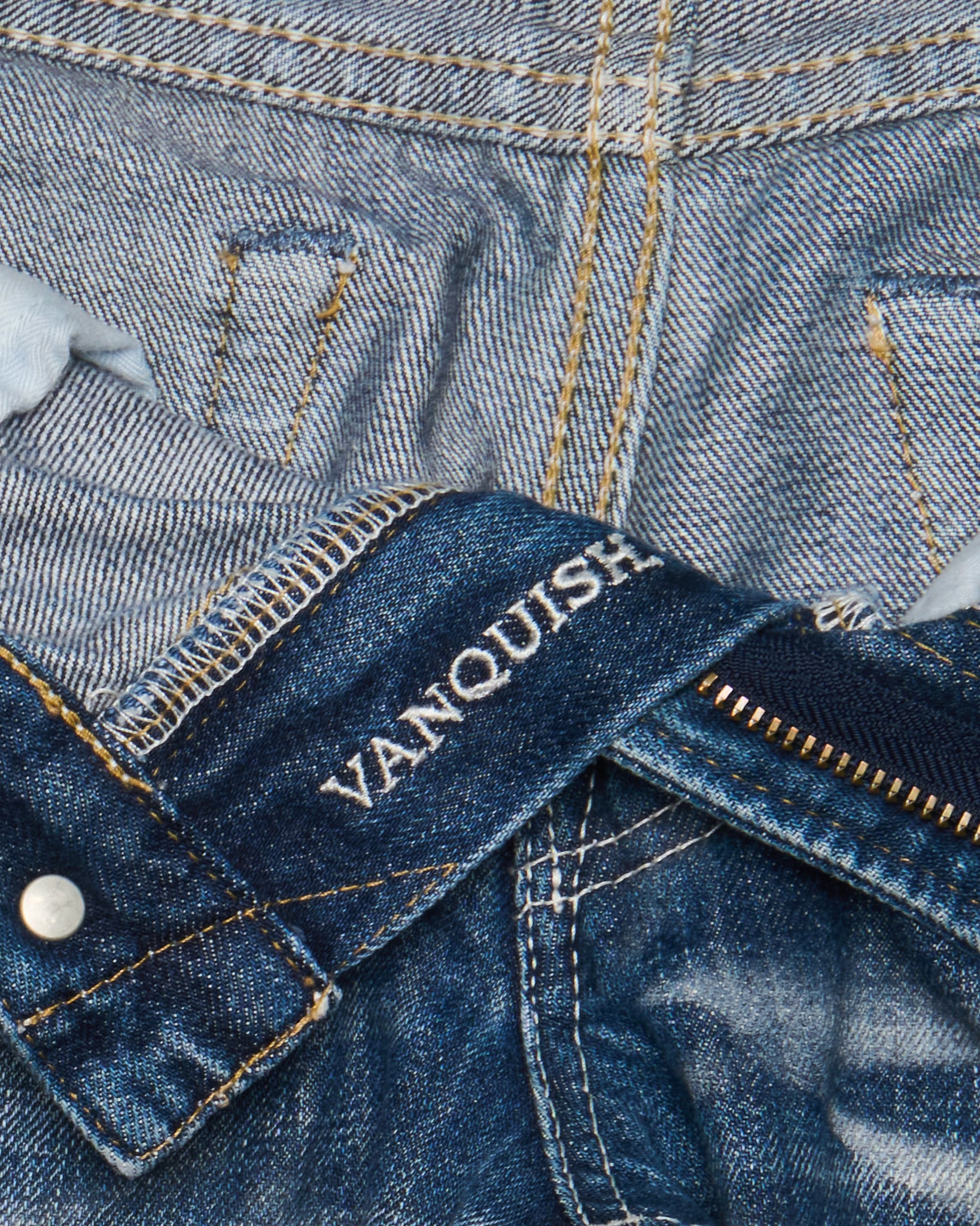 S/S11 VANQUISH Blue Washed Distressed Studded Bootcut Denim