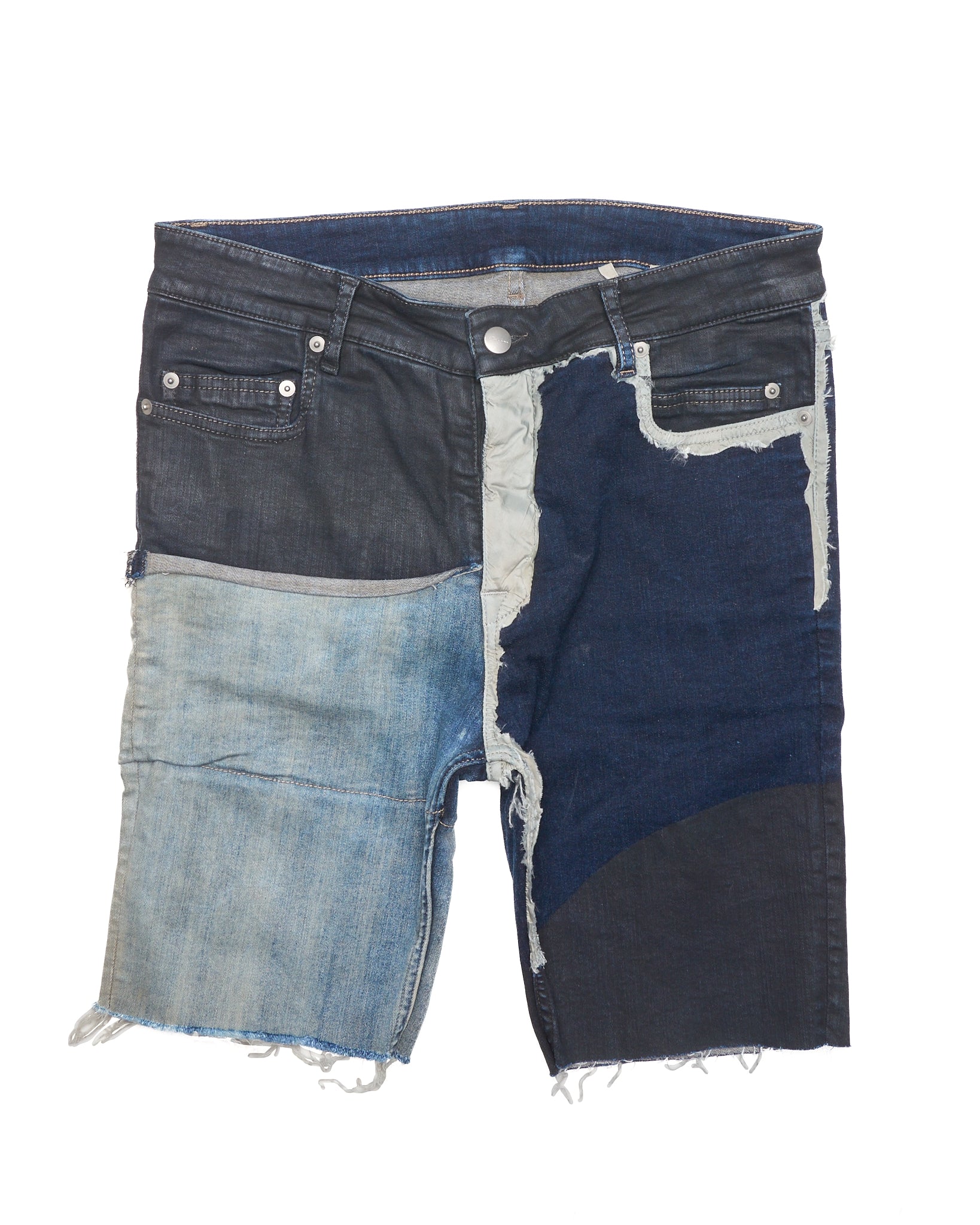 Denim shorts with a color-blocked design on a white background