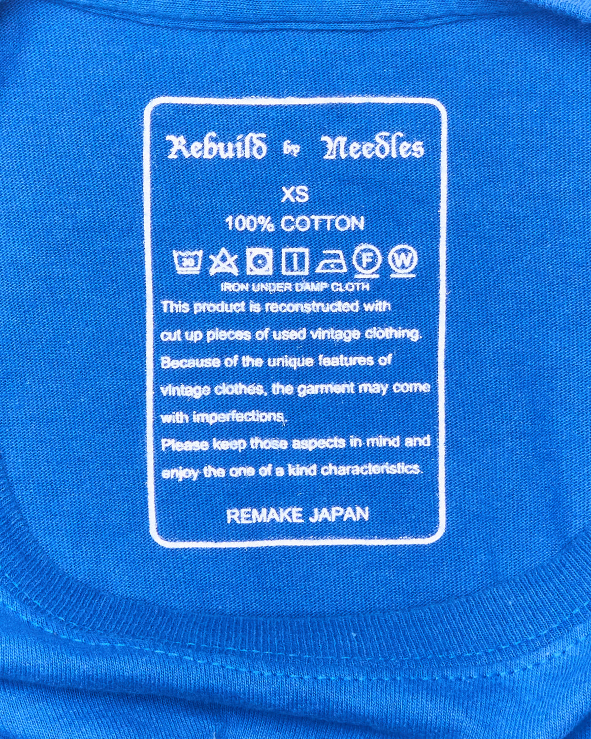 Needles “7 Cuts” Blue College Tee