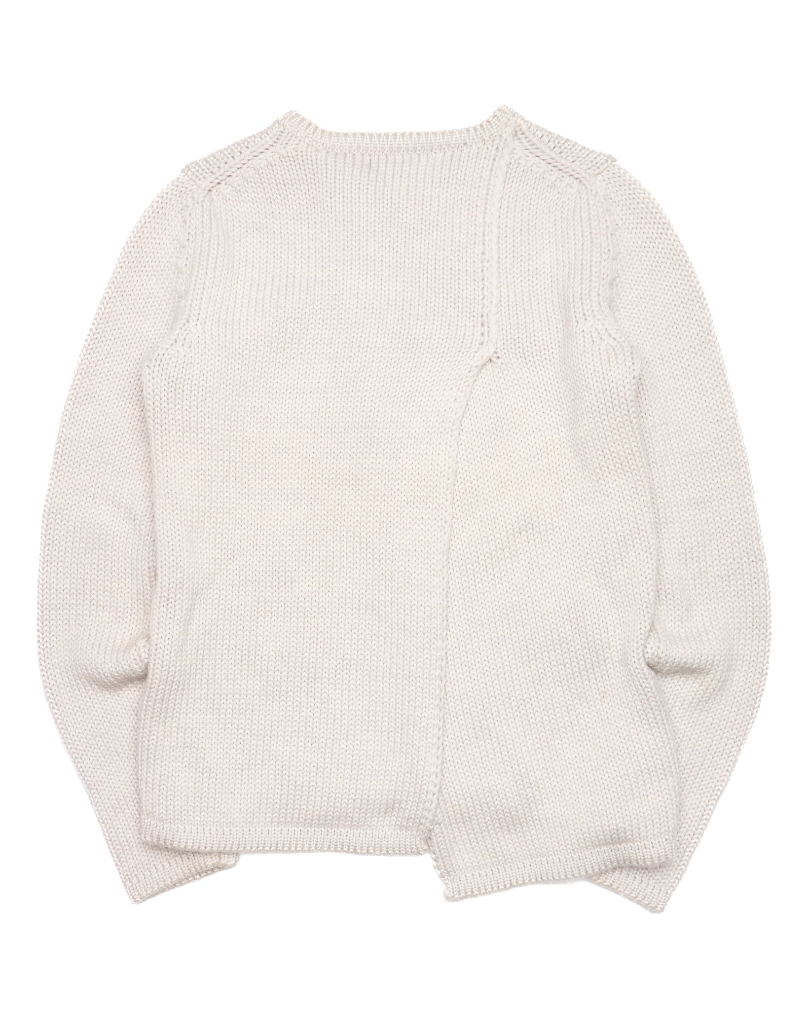 White knit sweater on a white background